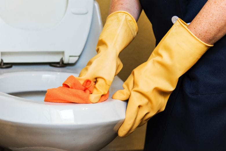 cleaning the toilet